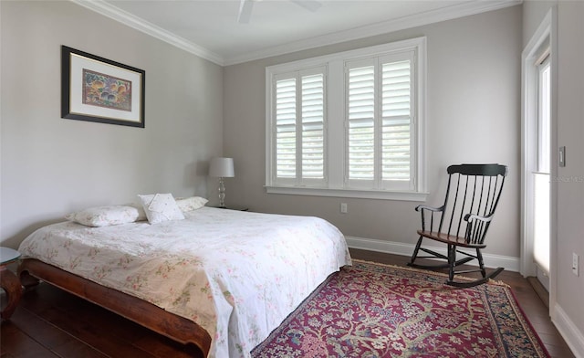 bedroom with ceiling fan, hardwood / wood-style floors, and crown molding