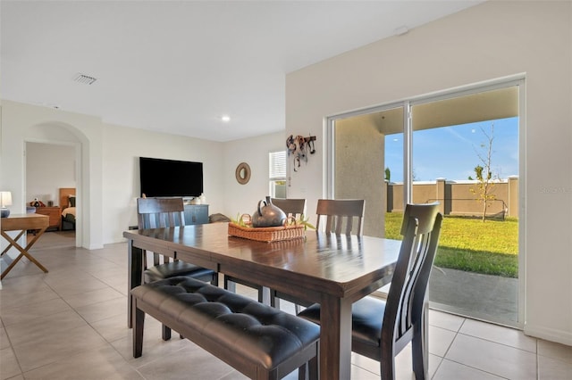 tiled dining area with plenty of natural light