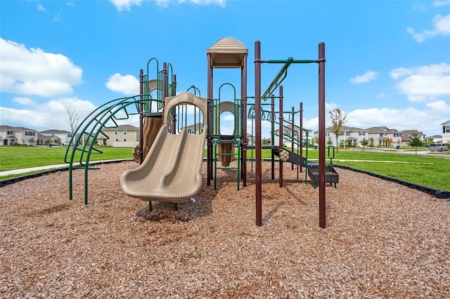 view of play area featuring a lawn