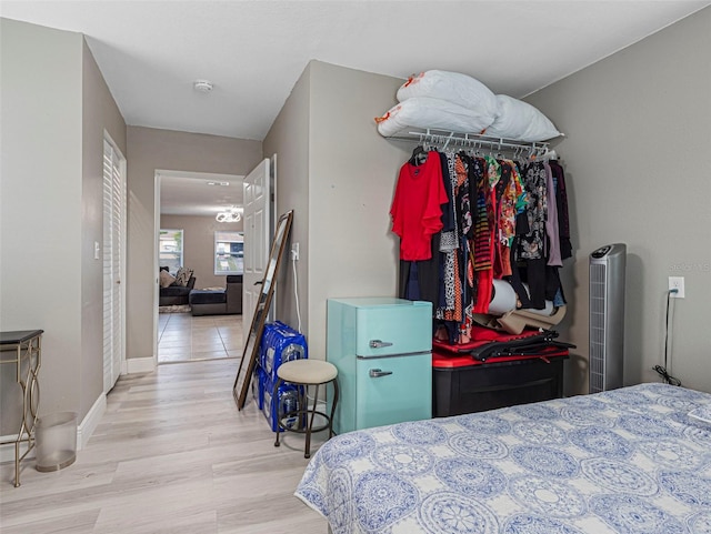 bedroom with light hardwood / wood-style floors