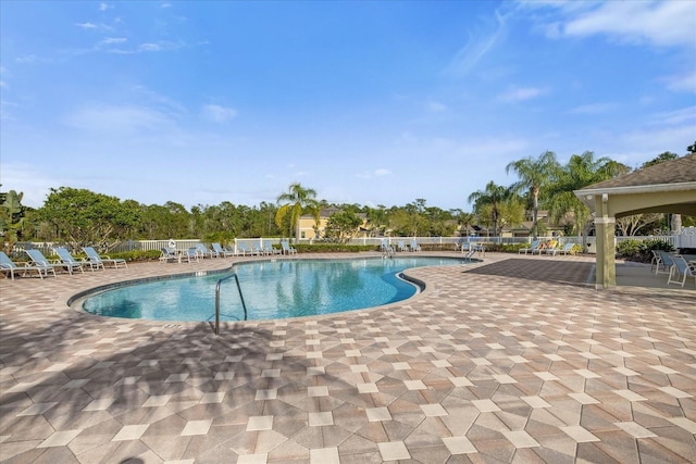 view of pool featuring a patio