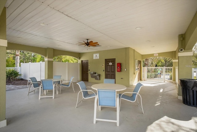 view of patio featuring ceiling fan