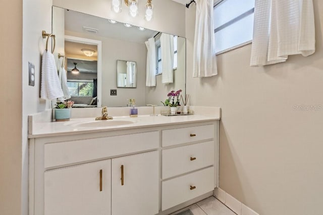 bathroom featuring tile patterned floors and vanity