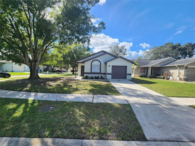 ranch-style house with a front yard and a garage