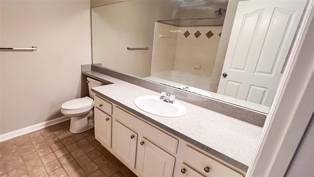 full bathroom with vanity, toilet, tiled shower / bath combo, and tile patterned flooring