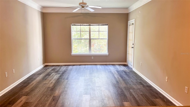 spare room with dark wood-type flooring, crown molding, and ceiling fan