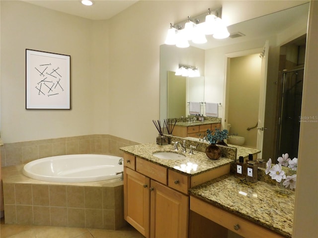 full bathroom with toilet, shower with separate bathtub, vanity, and tile patterned floors