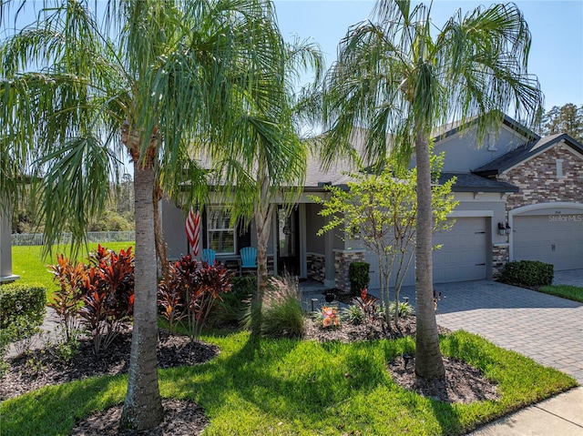 view of front of property with a garage