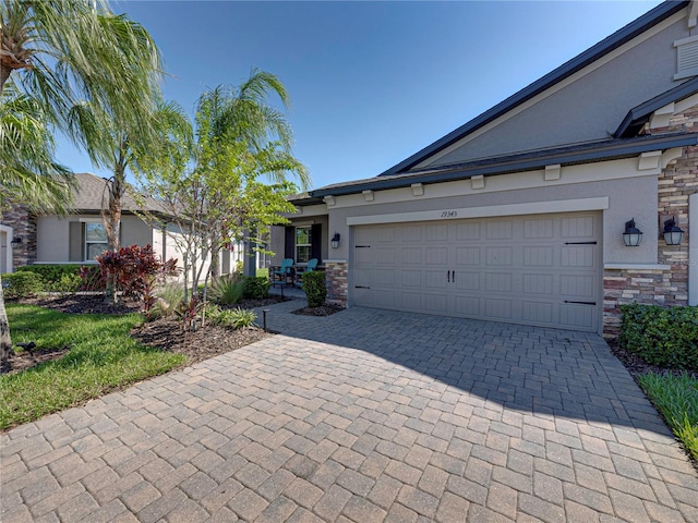 ranch-style house featuring a garage