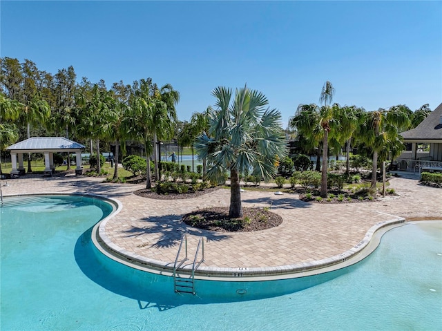 view of pool with a gazebo and a patio