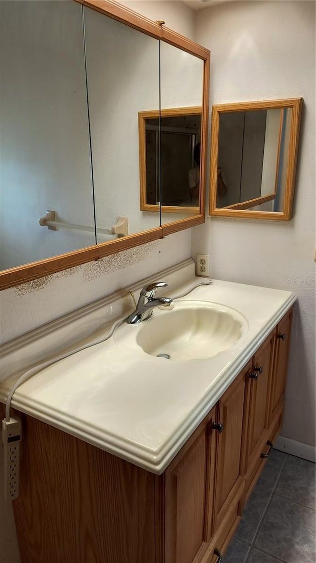 bathroom featuring vanity and tile patterned floors