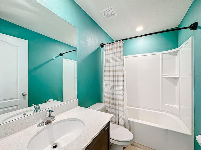 full bathroom featuring vanity, a textured ceiling, toilet, and shower / bathtub combination with curtain