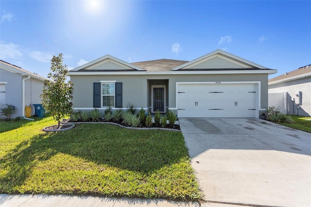 ranch-style home featuring a front lawn and a garage