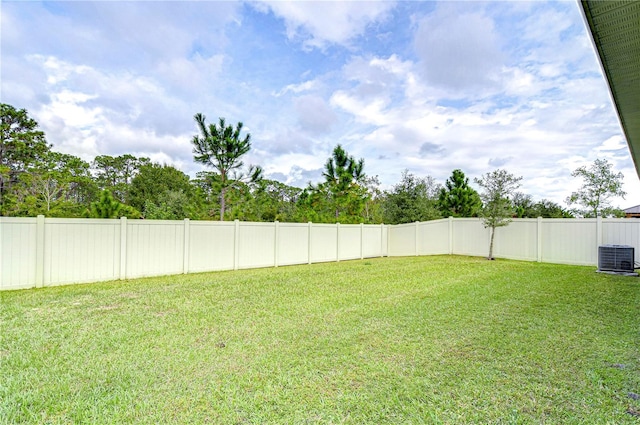 view of yard with central AC