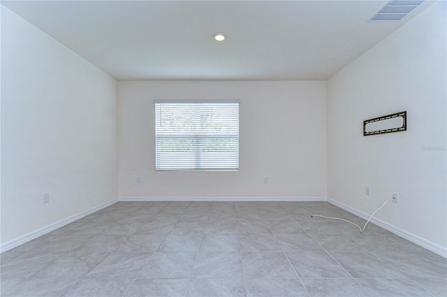 view of tiled empty room