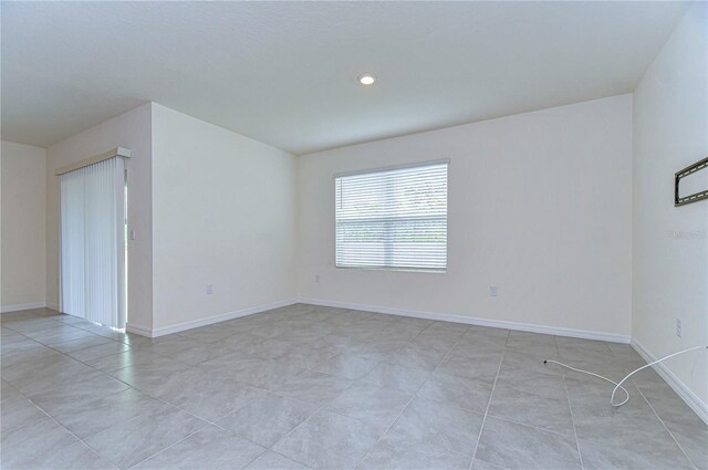 view of tiled empty room