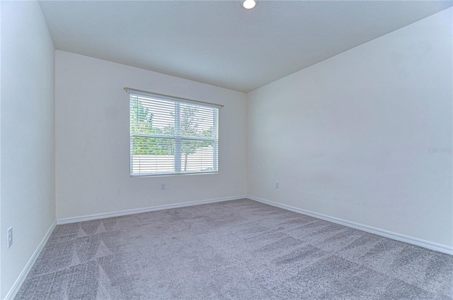 empty room featuring carpet floors