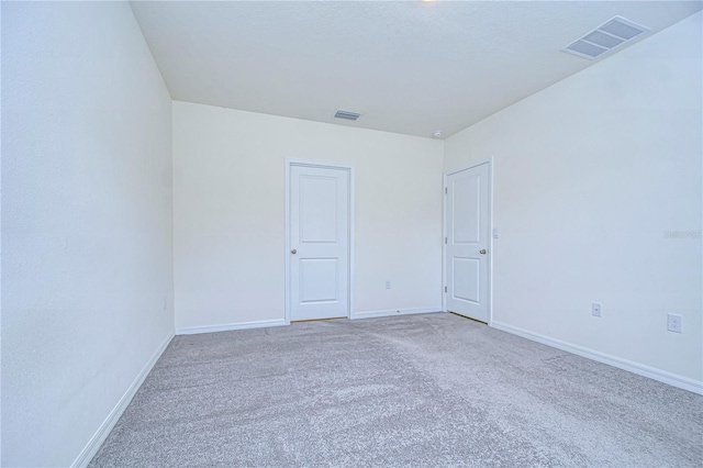 empty room with carpet floors