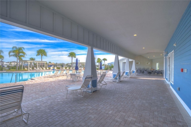 view of patio / terrace featuring a community pool