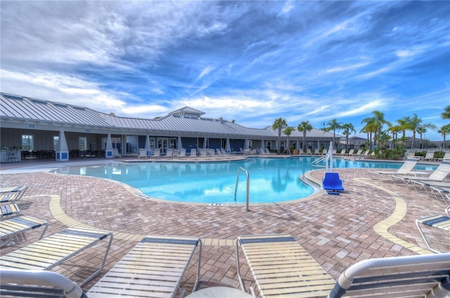 view of pool featuring a patio