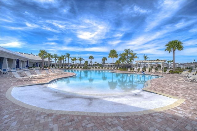 view of swimming pool featuring a patio