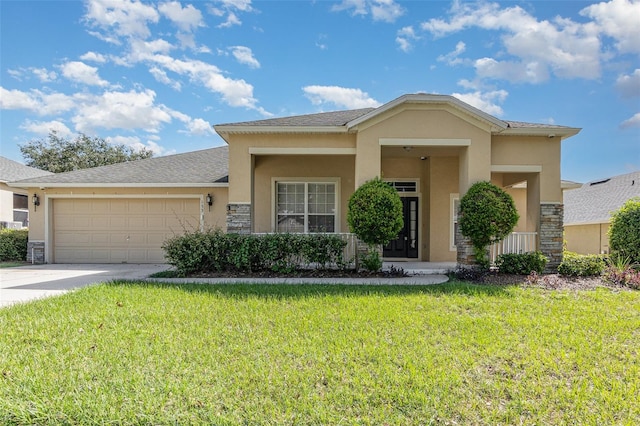 view of front of property with a front lawn and a garage