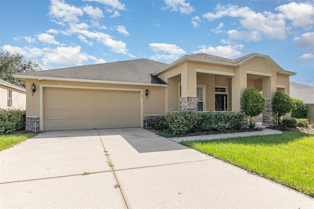 view of front of property with a garage