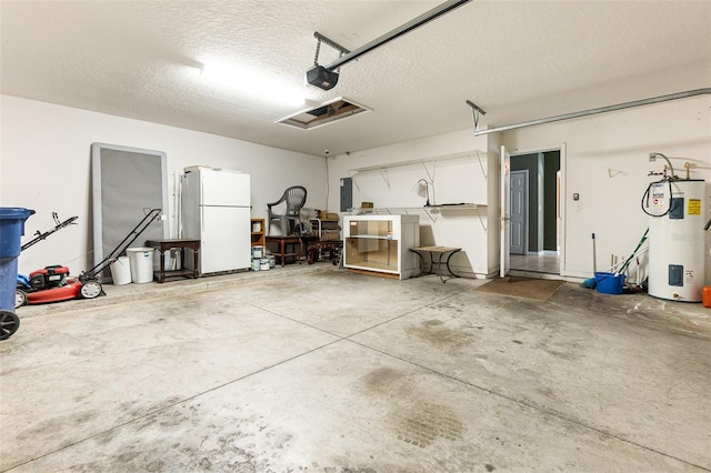 garage with a garage door opener, electric water heater, electric panel, and white fridge