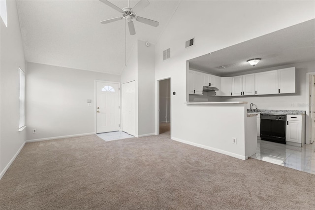 kitchen featuring high vaulted ceiling, dishwasher, white cabinetry, and light carpet