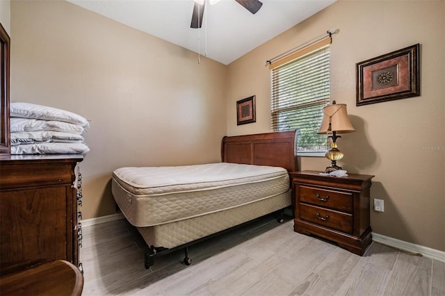 bedroom featuring ceiling fan and light hardwood / wood-style floors