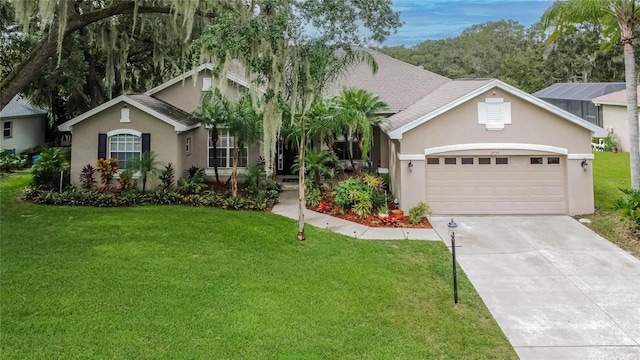 single story home featuring a front yard and a garage