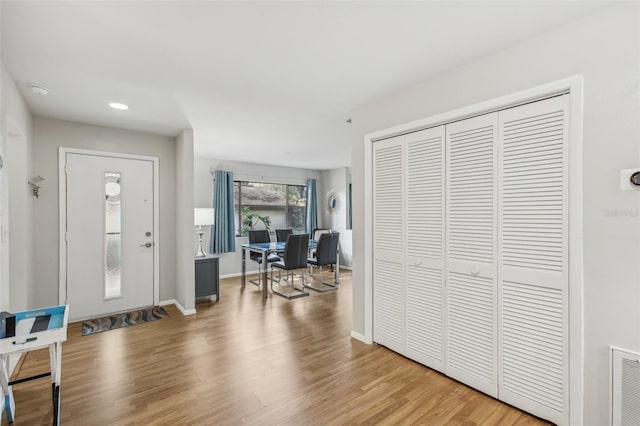 foyer entrance featuring hardwood / wood-style flooring