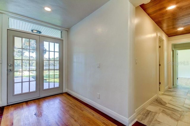 entryway with wooden ceiling