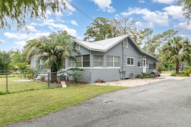 view of property exterior featuring a yard