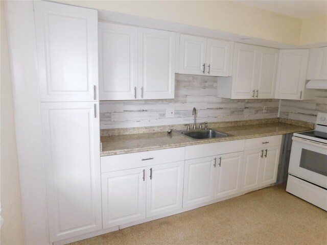 kitchen featuring white cabinets, white electric range, sink, and exhaust hood