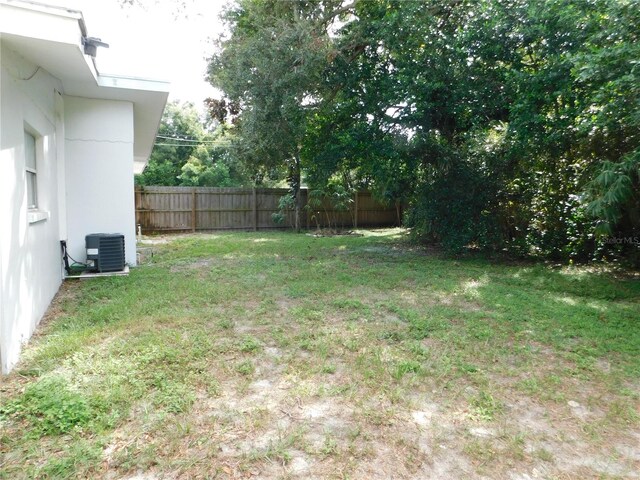 view of yard with central AC