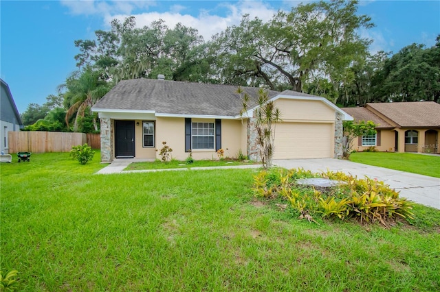 ranch-style home featuring a garage and a front lawn