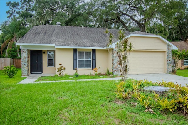 ranch-style home featuring a front yard and a garage