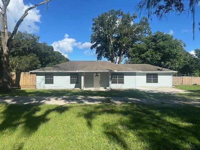 view of front of home with a front yard