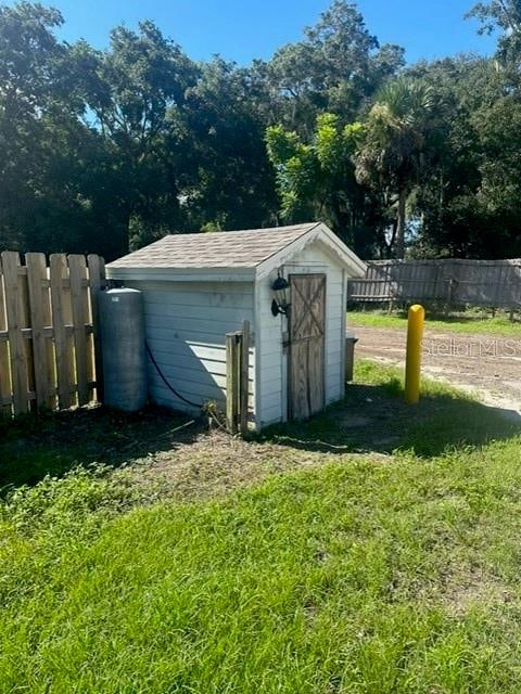 view of outdoor structure featuring a yard