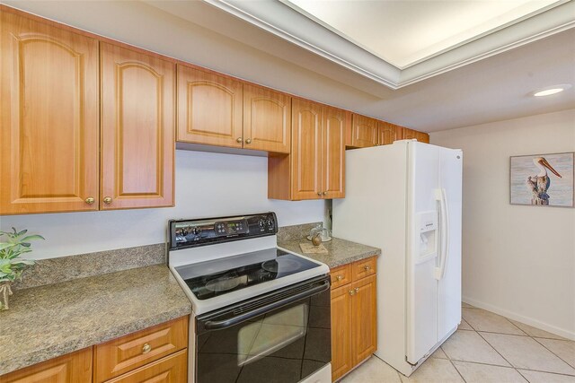 kitchen with light tile patterned floors, electric range, stone countertops, white fridge with ice dispenser, and ornamental molding