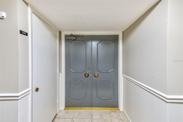 220 Belleview Blvd Unit 802, Belleair, FL 33756 - corridor featuring light marble finish flooring
