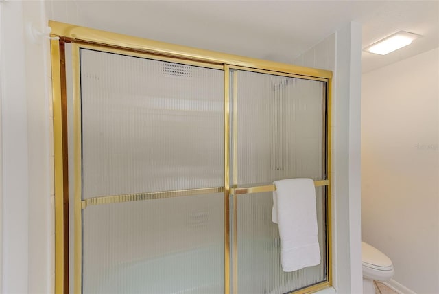 220 Belleview Blvd Unit 802, Belleair, FL 33756 - bathroom featuring a shower stall and toilet