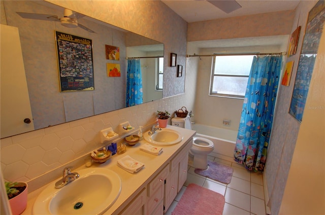 full bathroom featuring tile patterned floors, shower / bath combo, toilet, backsplash, and vanity