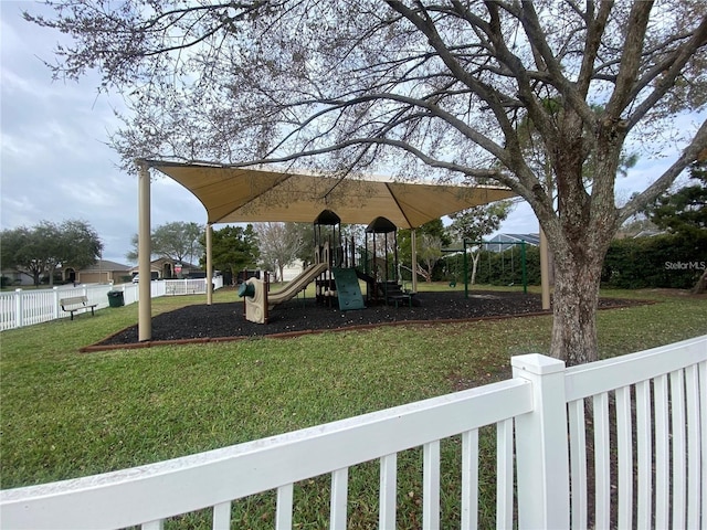 view of play area featuring a lawn