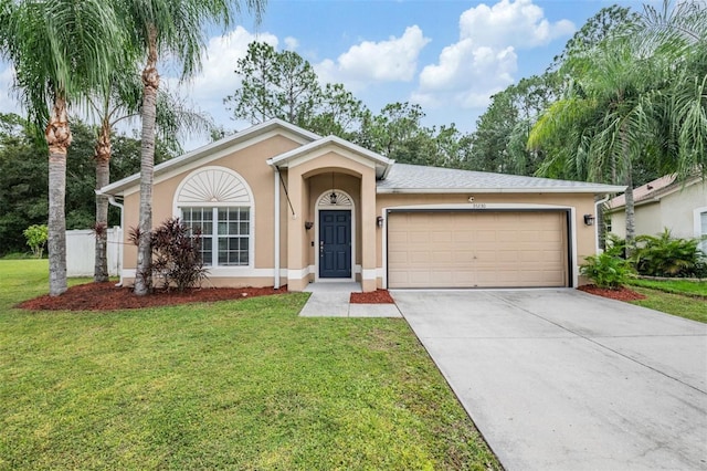 ranch-style house with a front yard and a garage