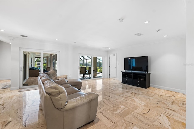 living room featuring crown molding