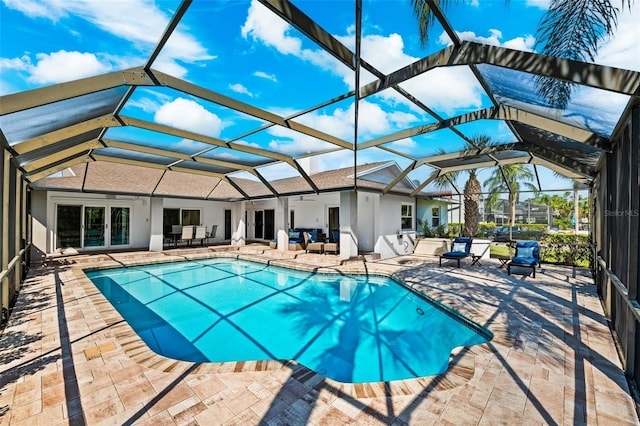 view of pool featuring a patio and a lanai