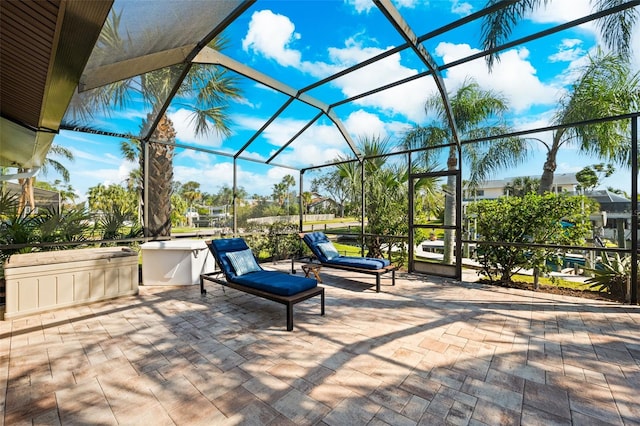 view of patio with a lanai