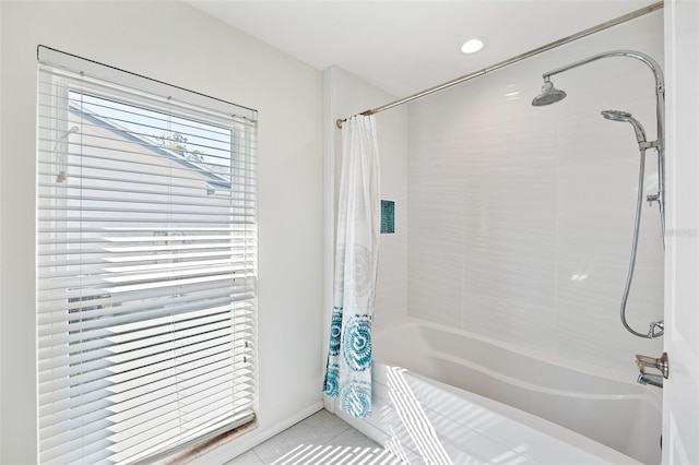 bathroom featuring tile patterned floors and shower / bath combination with curtain